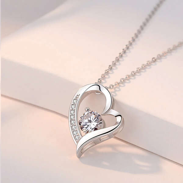 A necklace with a heart pendant - Belovia - AI WEB SHOP